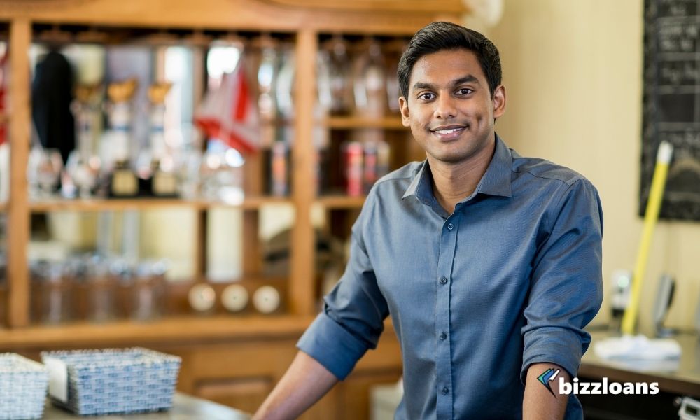 business owner smiling in his shop