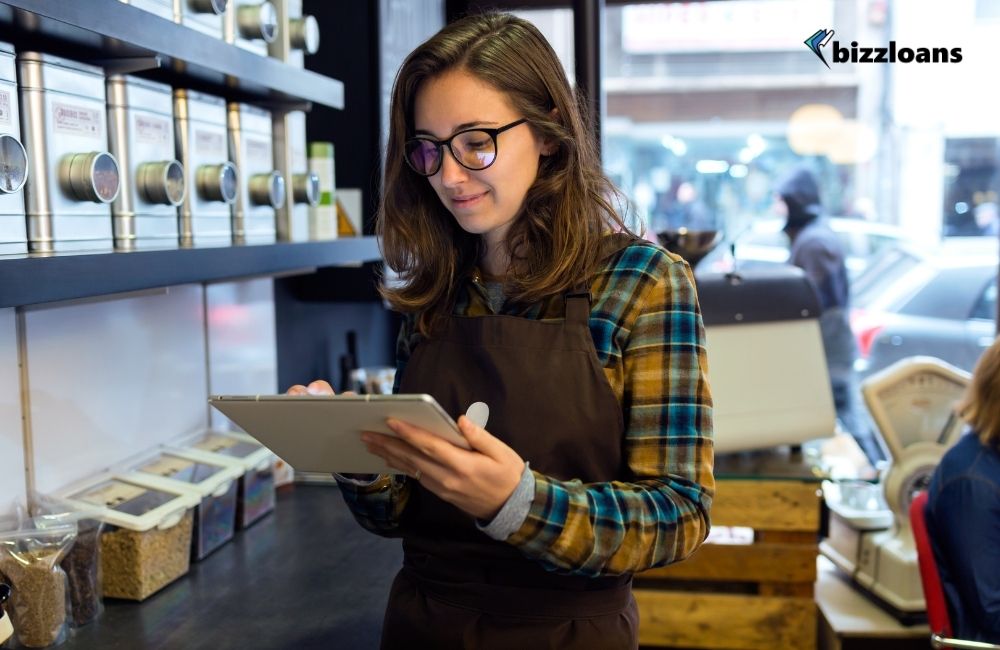 Young business owner doing inventory management in a retail shop