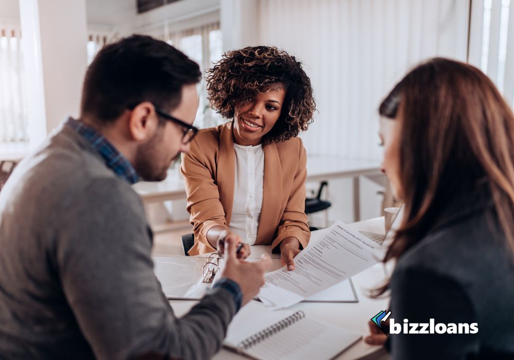 business owners talking to a lender