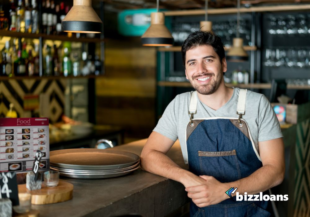 happy business owner inside the restaurant