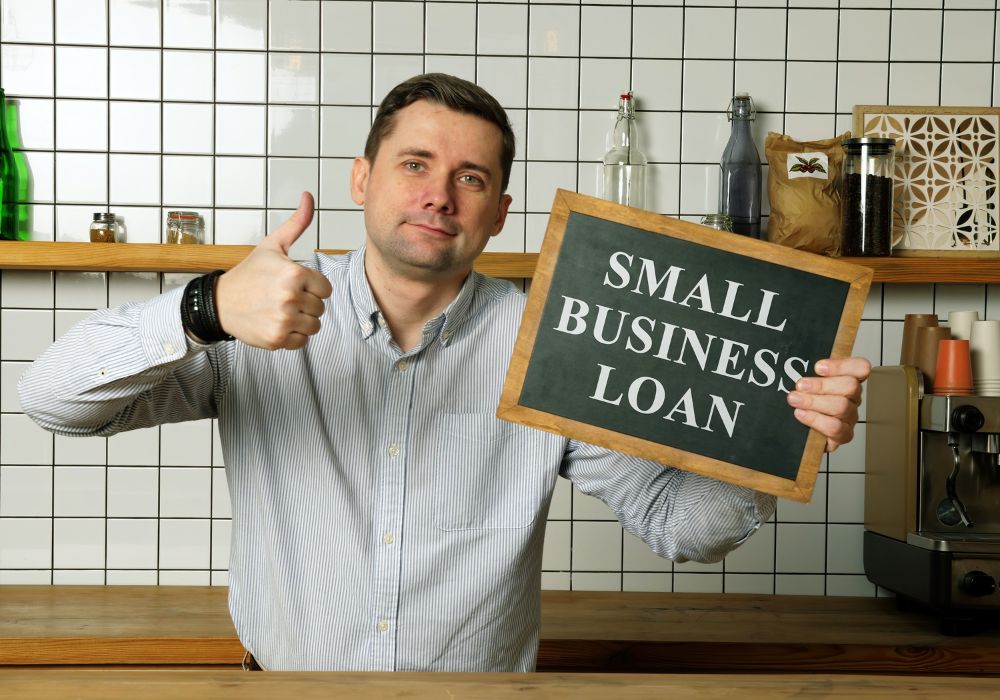 Small business loan in the businessman hands.